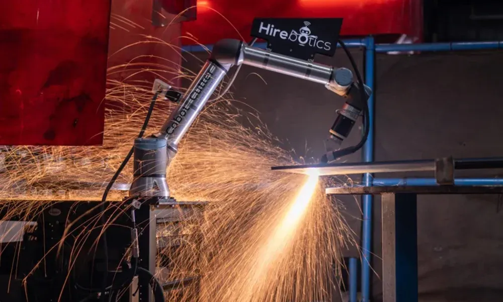 Cobot Cutter making a precision plasma cut