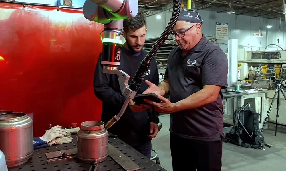 Cobot welder on marine exhaust components at DeAngelo Marine